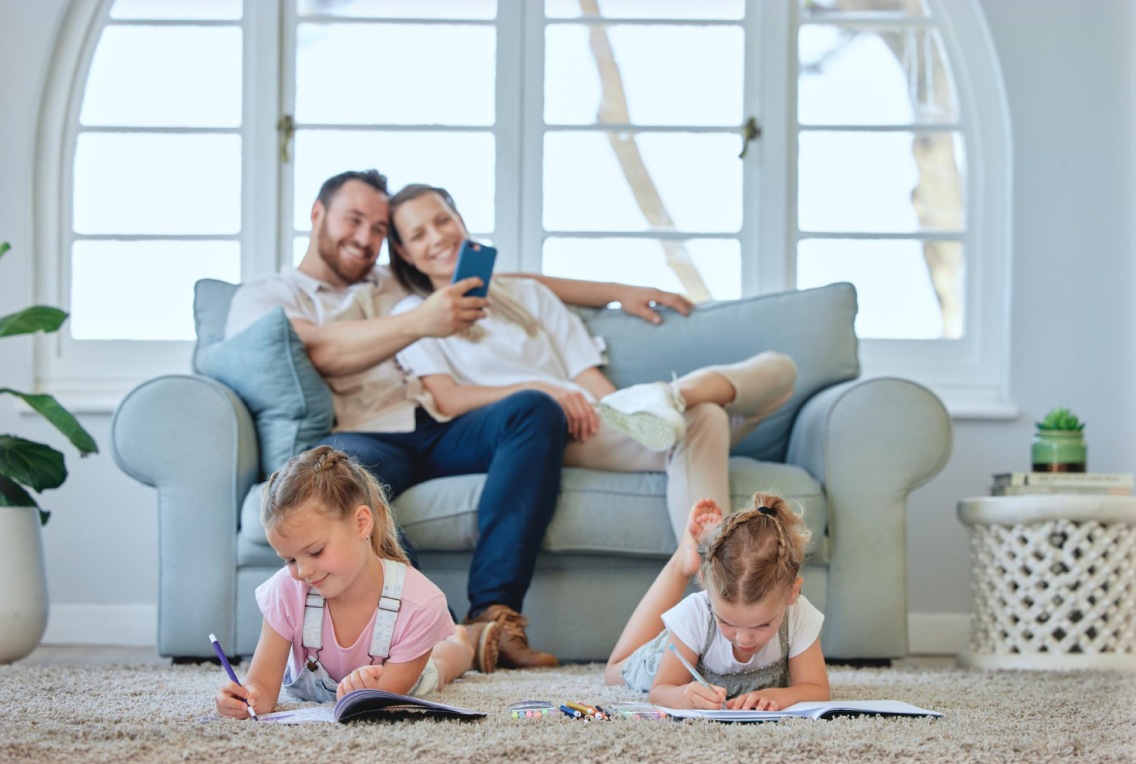 Family relaxing on couch